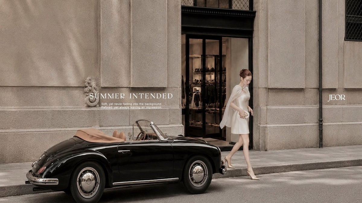 Summer Intended - JEOR campaign, a black cabriolet outside the boutique